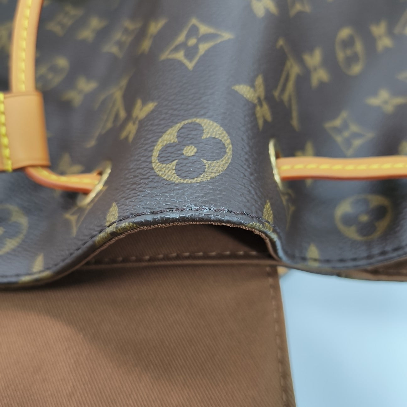 TRIO Monogram Coated Canvas Brown