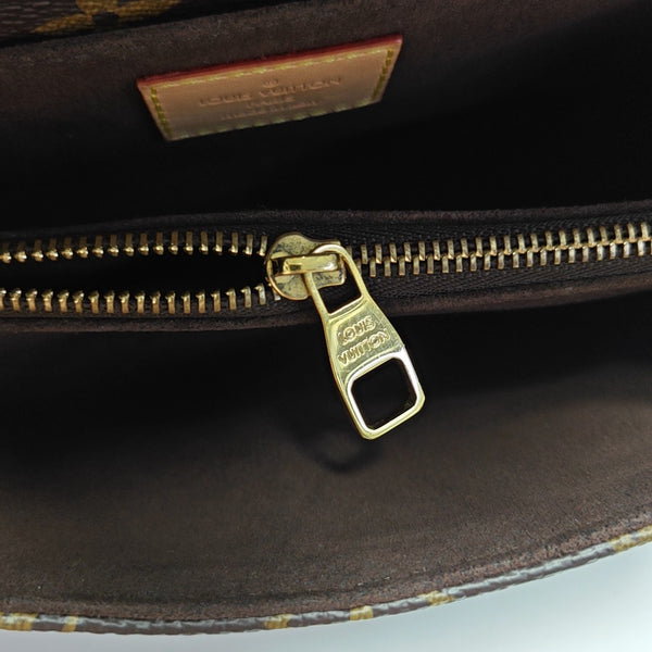 MÉTIS EAST WEST Monogram Coated Canvas Brown