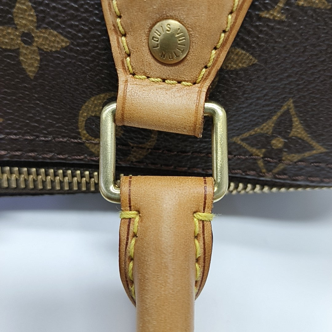 SPEEDY 25 Monogram Coated Canvas Brown