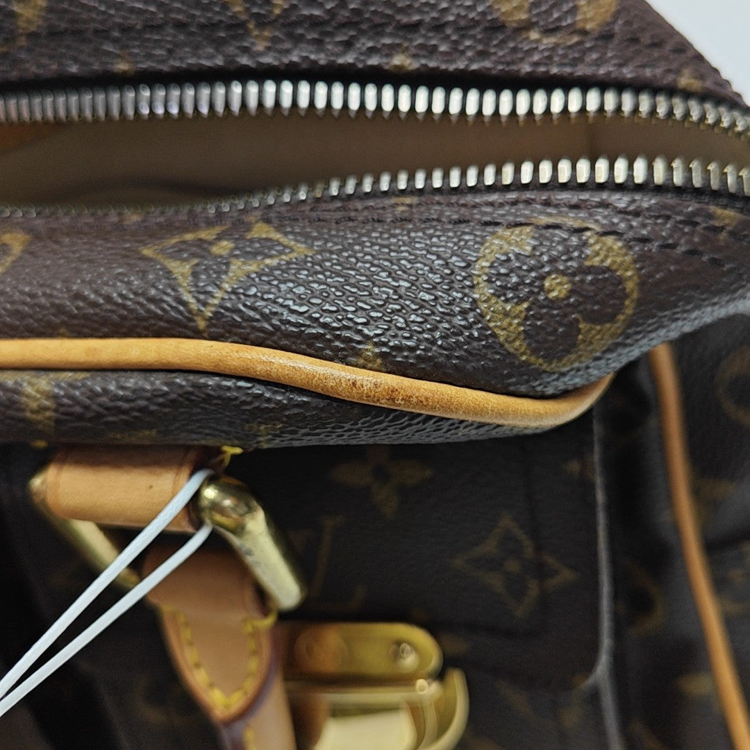 MANHATTAN PM Monogram Coated Canvas Brown