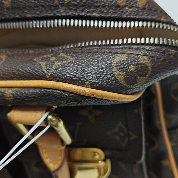 MANHATTAN PM Monogram Coated Canvas Brown