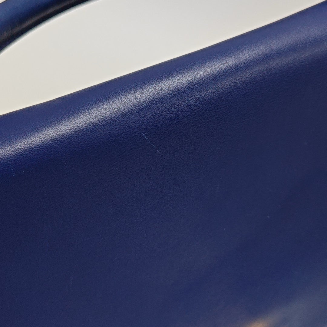 TRAPEZE Medium Calfskin Blue