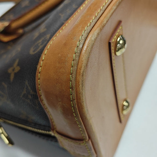 ALMA PM Monogram Coated Canvas Brown