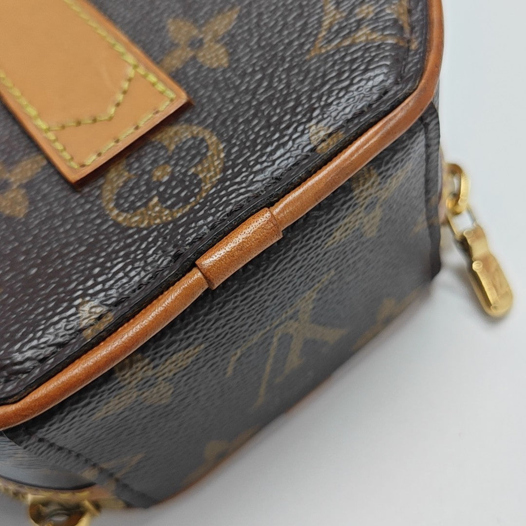BOITE CHAPEAU Mini Monogram Coated Canvas Brown