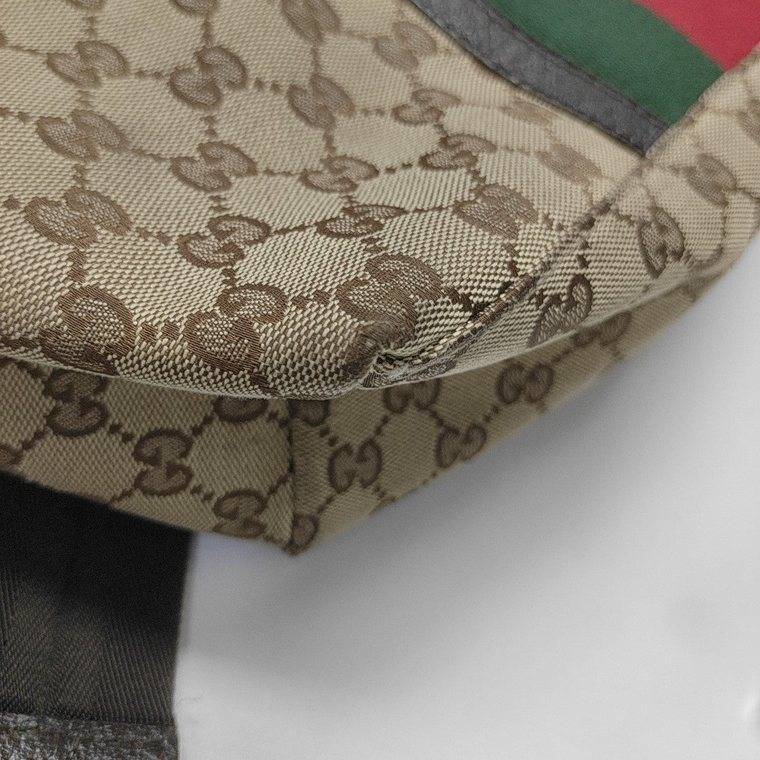 Signature Monogram Canvas Brown
