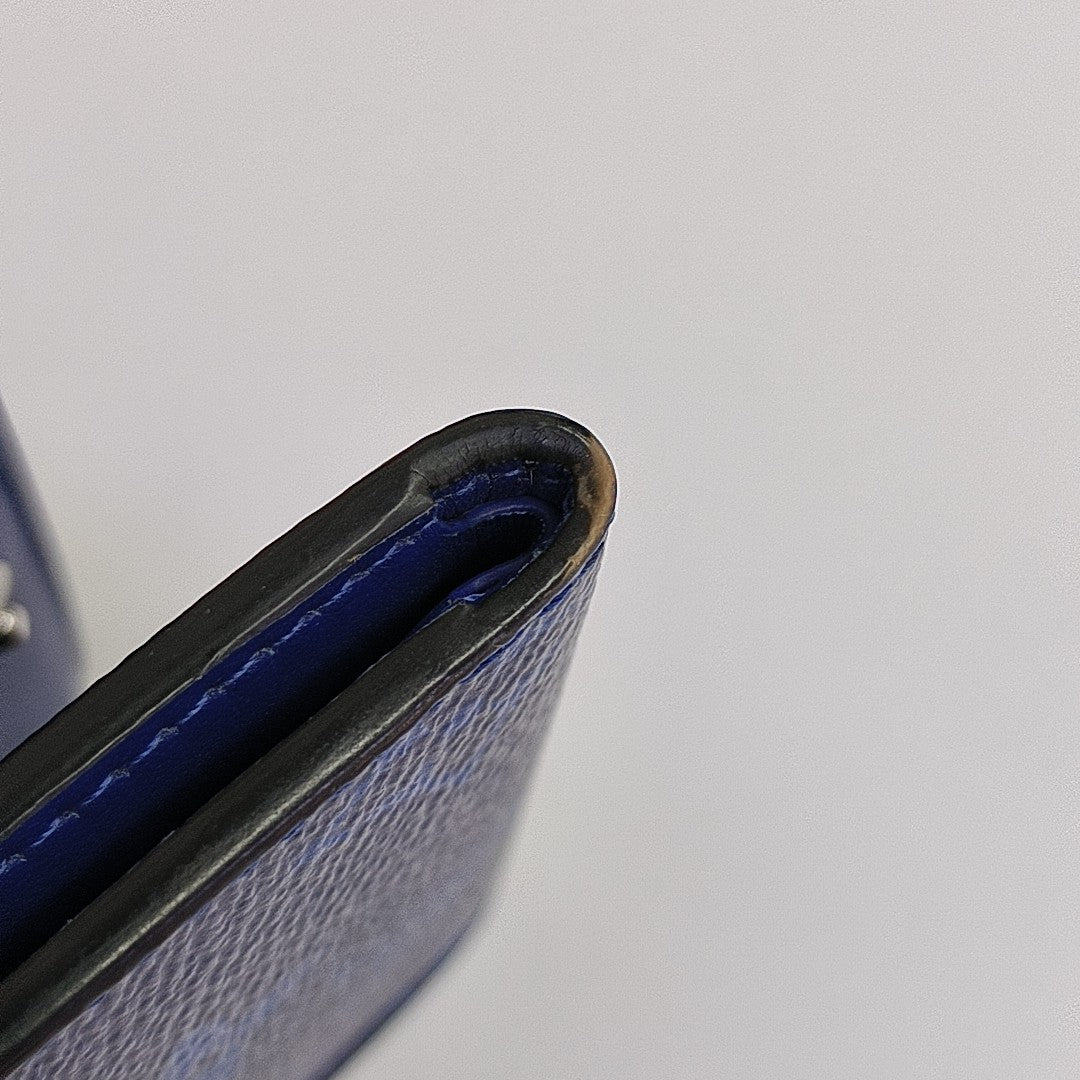 DISCOVERY Monogram Calfskin Blue Wallet