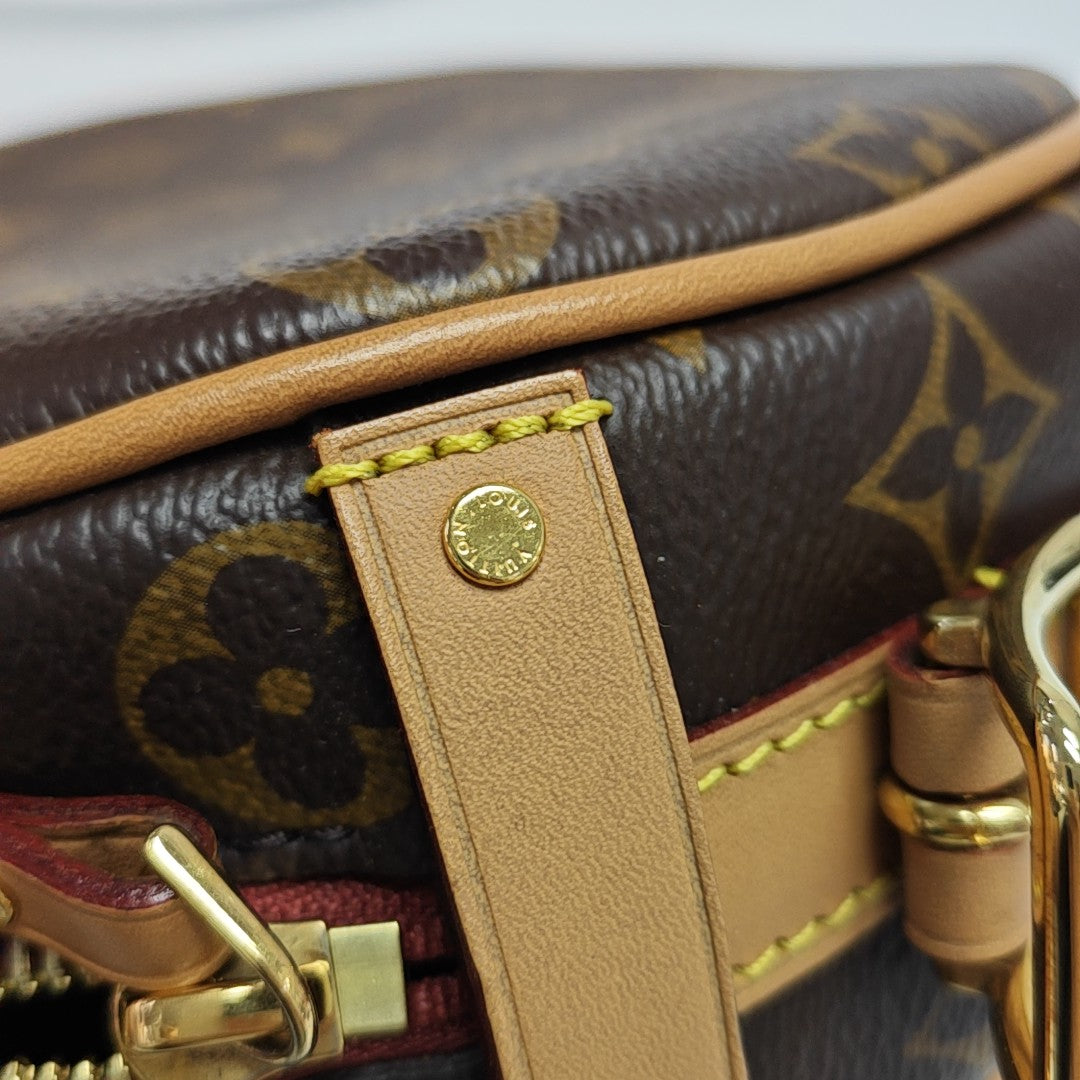 BOITE CHAPEAU PM Monogram Coated Canvas Brown