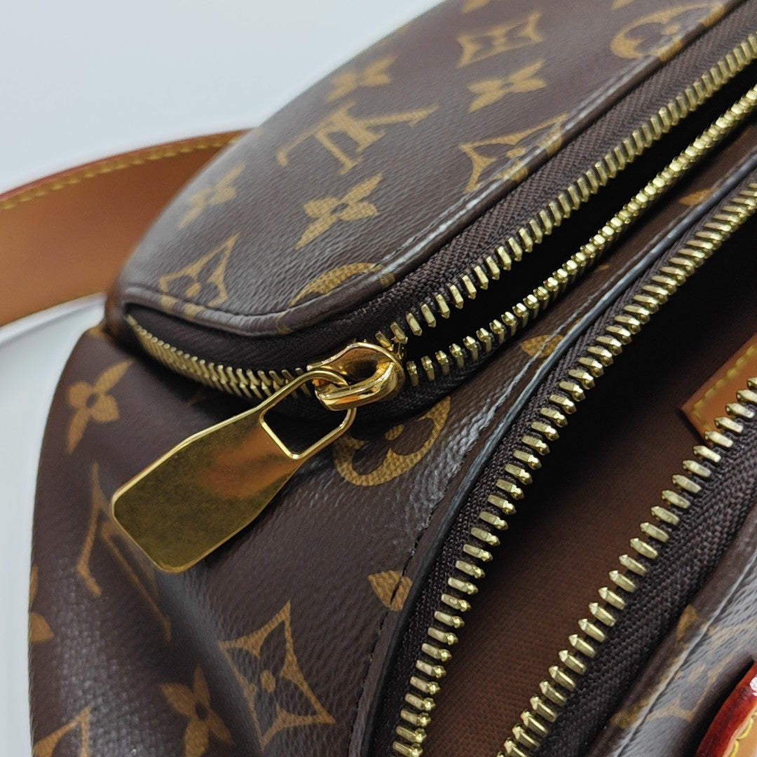 RUSH Monogram Coated Canvas Brown