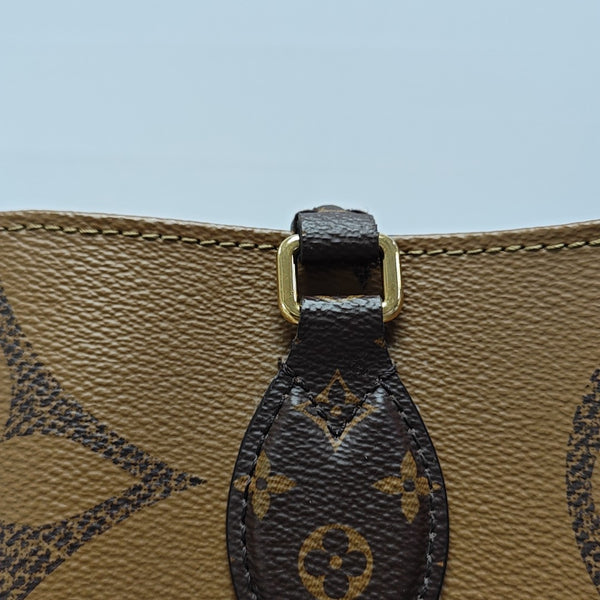 ONTHEGO GM Monogram Coated Canvas Brown