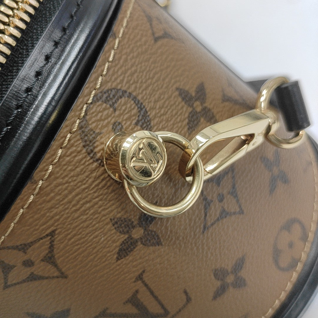 CANNES PM Monogram Coated Canvas Brown