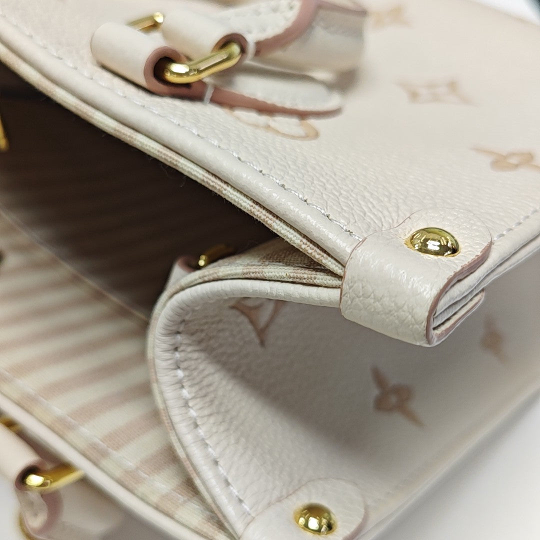 ONTHEGO PM Monogram Calfskin Beige
