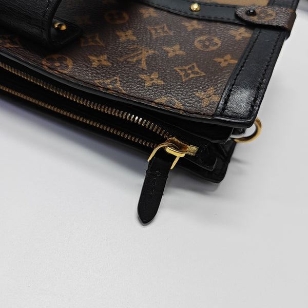TRUNK Monogram Coated Canvas Brown