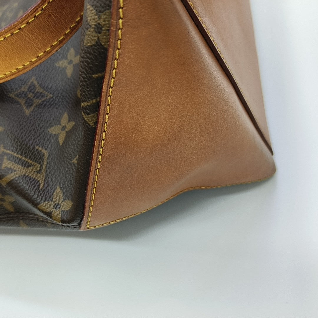 PIANO Monogram Coated Canvas Brown