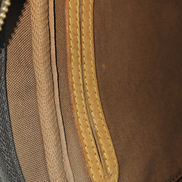 MONTORGUEI PM Monogram Coated Canvas Brown