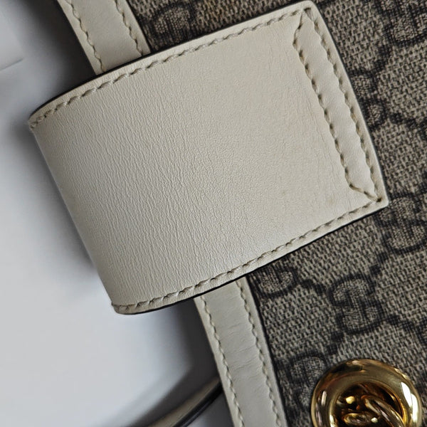 Padlock Small Monogram Coated Canvas Beige