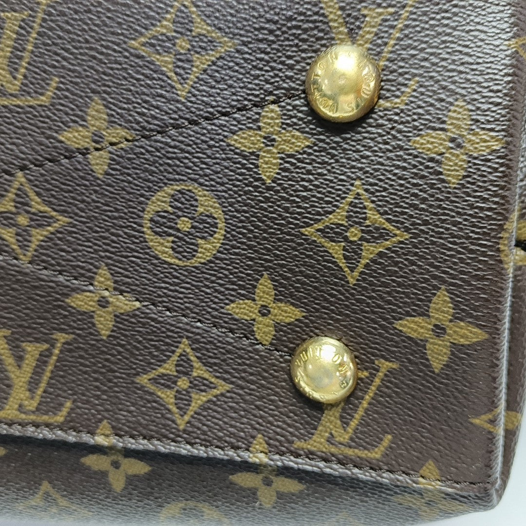 MÉTIS Monogram Coated Canvas Brown