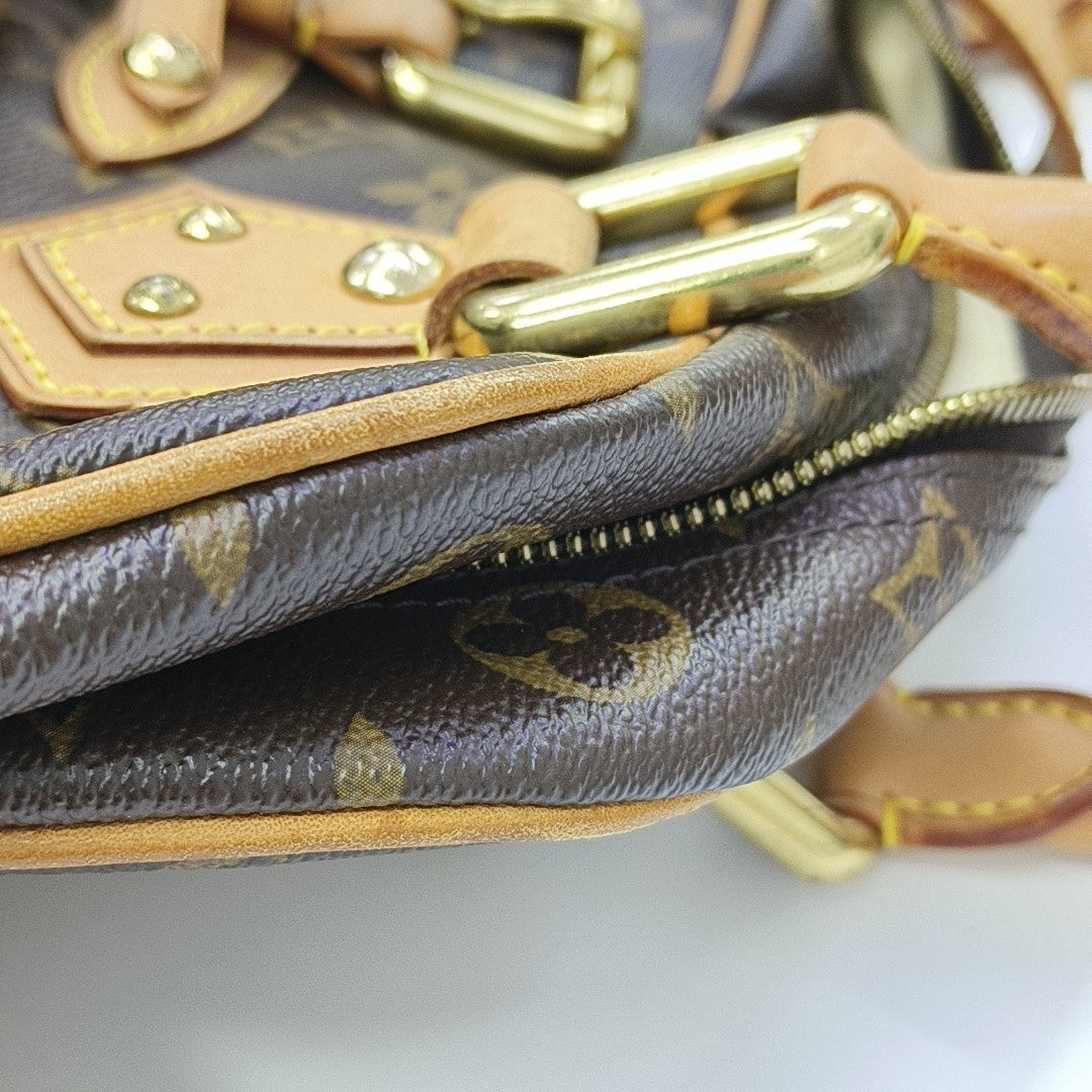 MANHATTAN GM Monogram Coated Canvas Brown