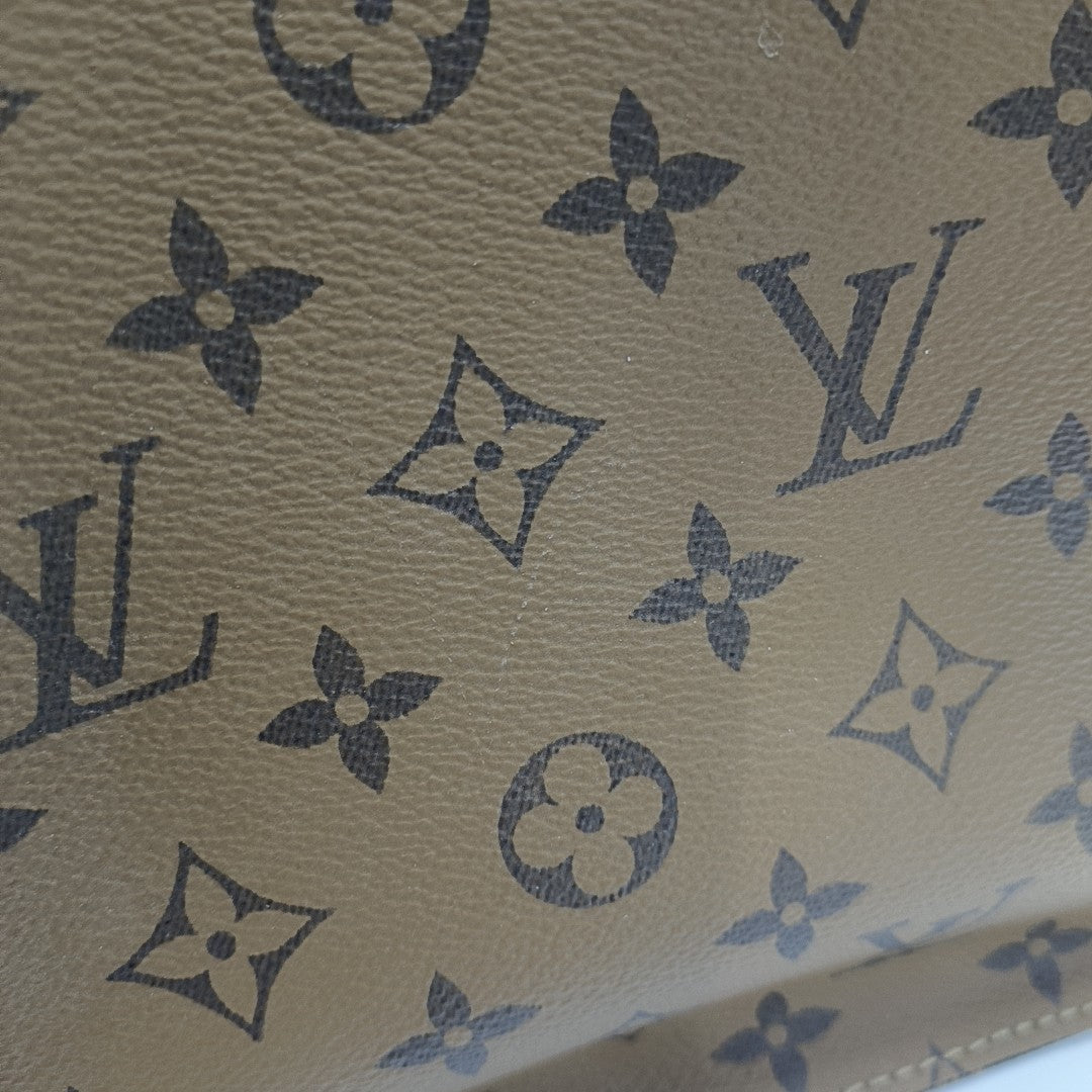 ONTHEGO GM Monogram Coated Canvas Brown