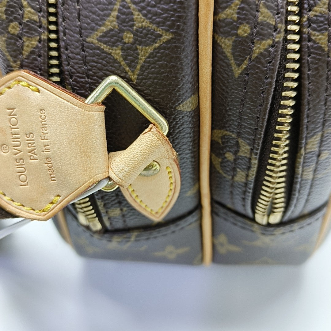 REPORTER PM Monogram Coated Canvas Brown