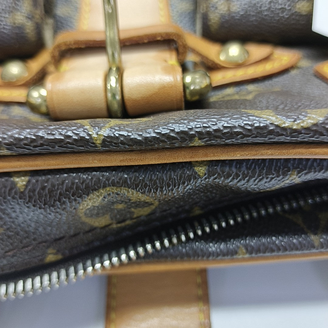 MANHATTAN GM Monogram Coated Canvas Brown