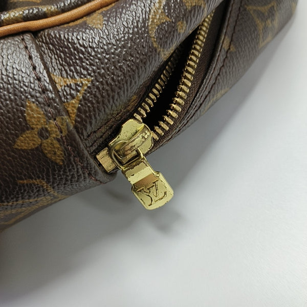 EXCENTRI-CITE Monogram Coated Canvas Brown