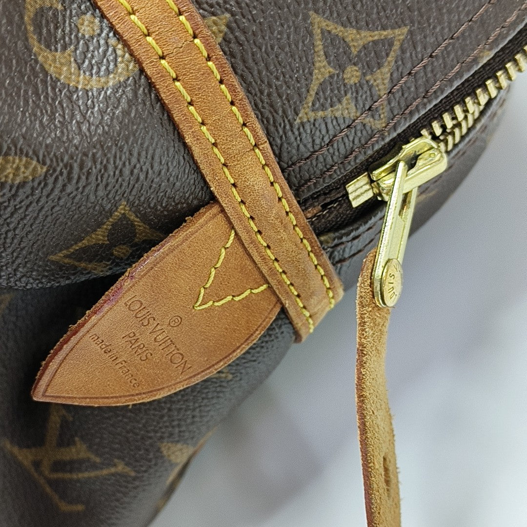 MONTORGUEI PM Monogram Coated Canvas Brown