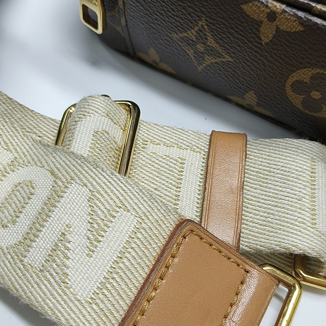 UTILITY Monogram Coated Canvas Brown