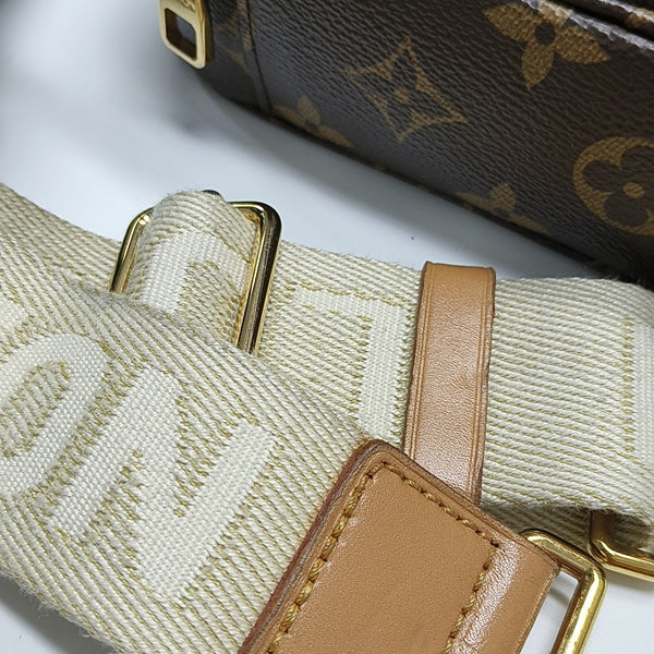 UTILITY Monogram Coated Canvas Brown