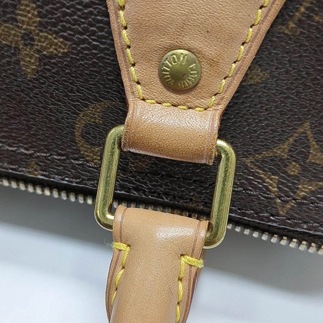 SPEEDY 25 Monogram Coated Canvas Brown
