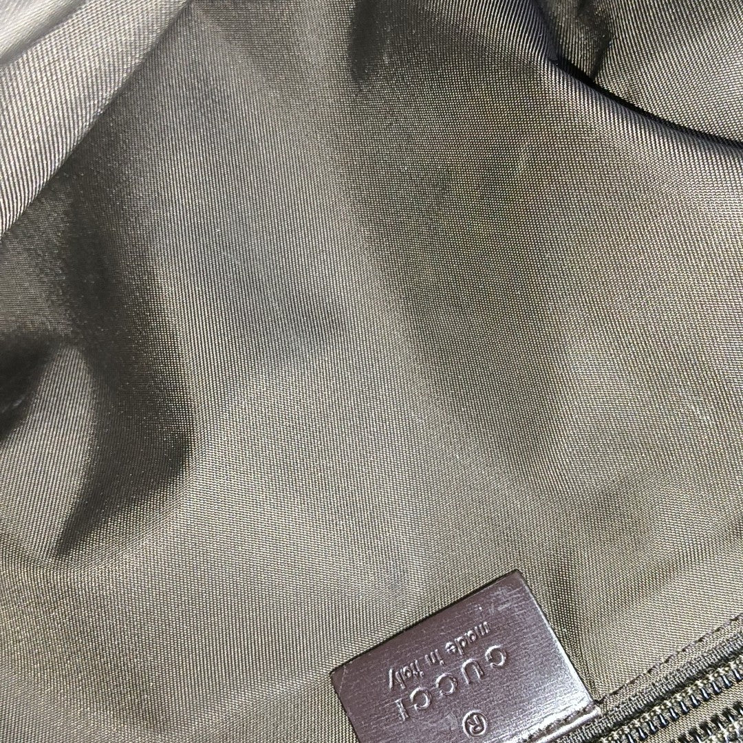 Monogram Coated Canvas Backpack Brown
