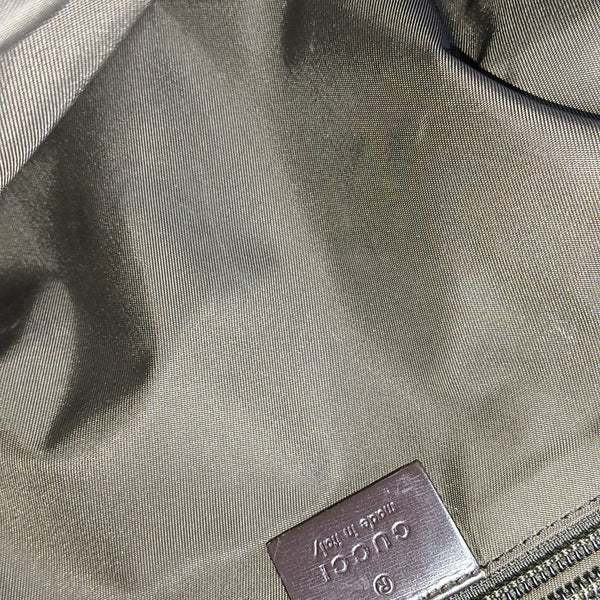Monogram Coated Canvas Backpack Brown