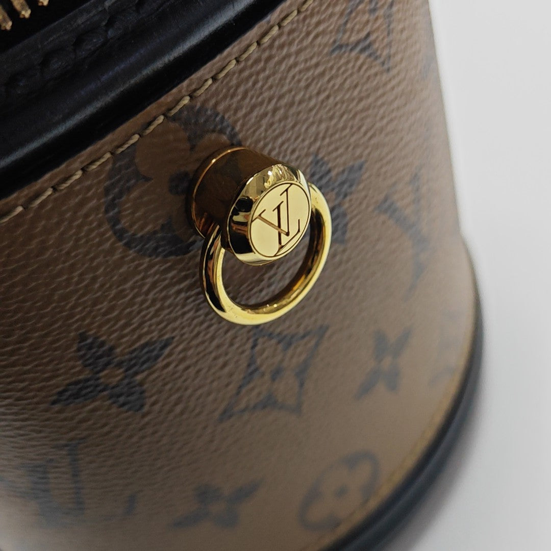 CANNES PM Monogram Coated Canvas Brown