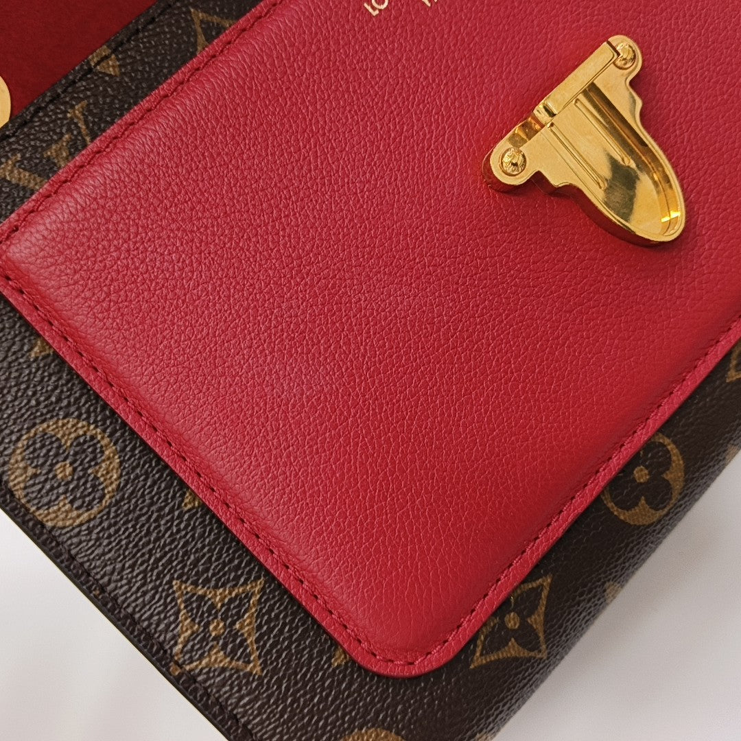 VICTOIRE Monogram Coated Canvas Brown