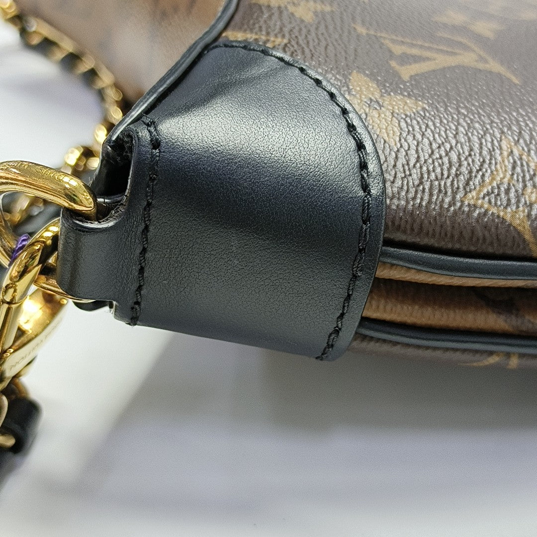 TWINNY Monogram Coated Canvas Brown