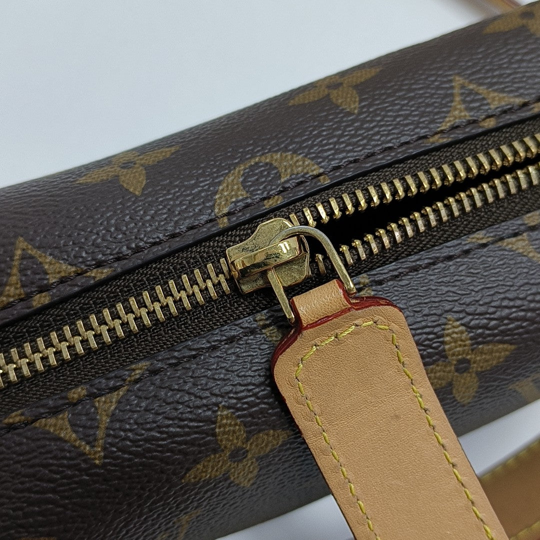 SIDE TRUNK PM Monogram Coated Canvas Brown