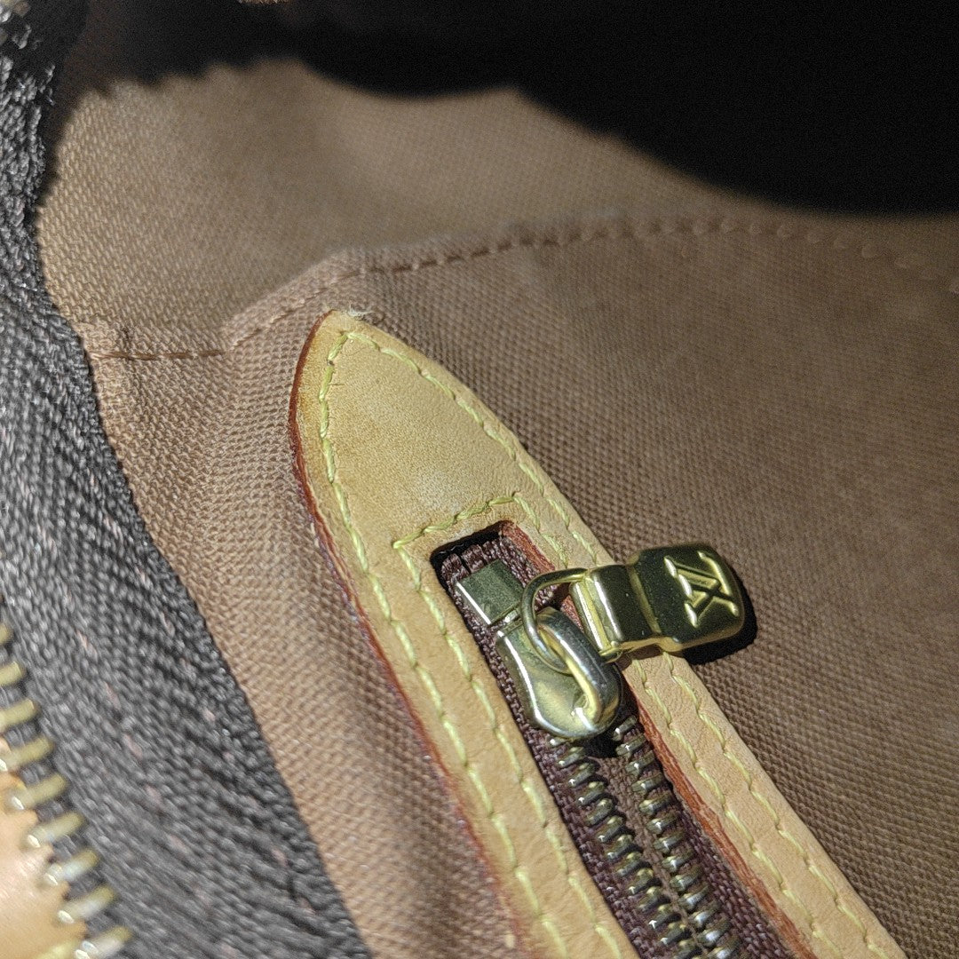 SPEEDY 25 Monogram Coated Canvas Brown