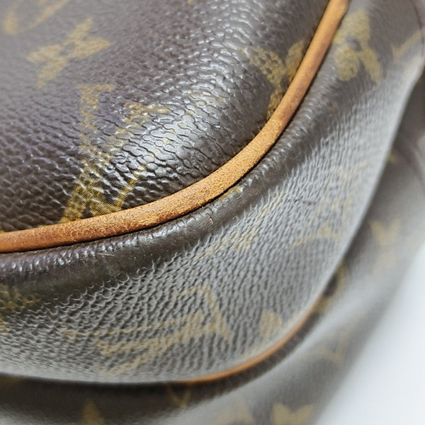 REPORTER PM Monogram Coated Canvas Brown