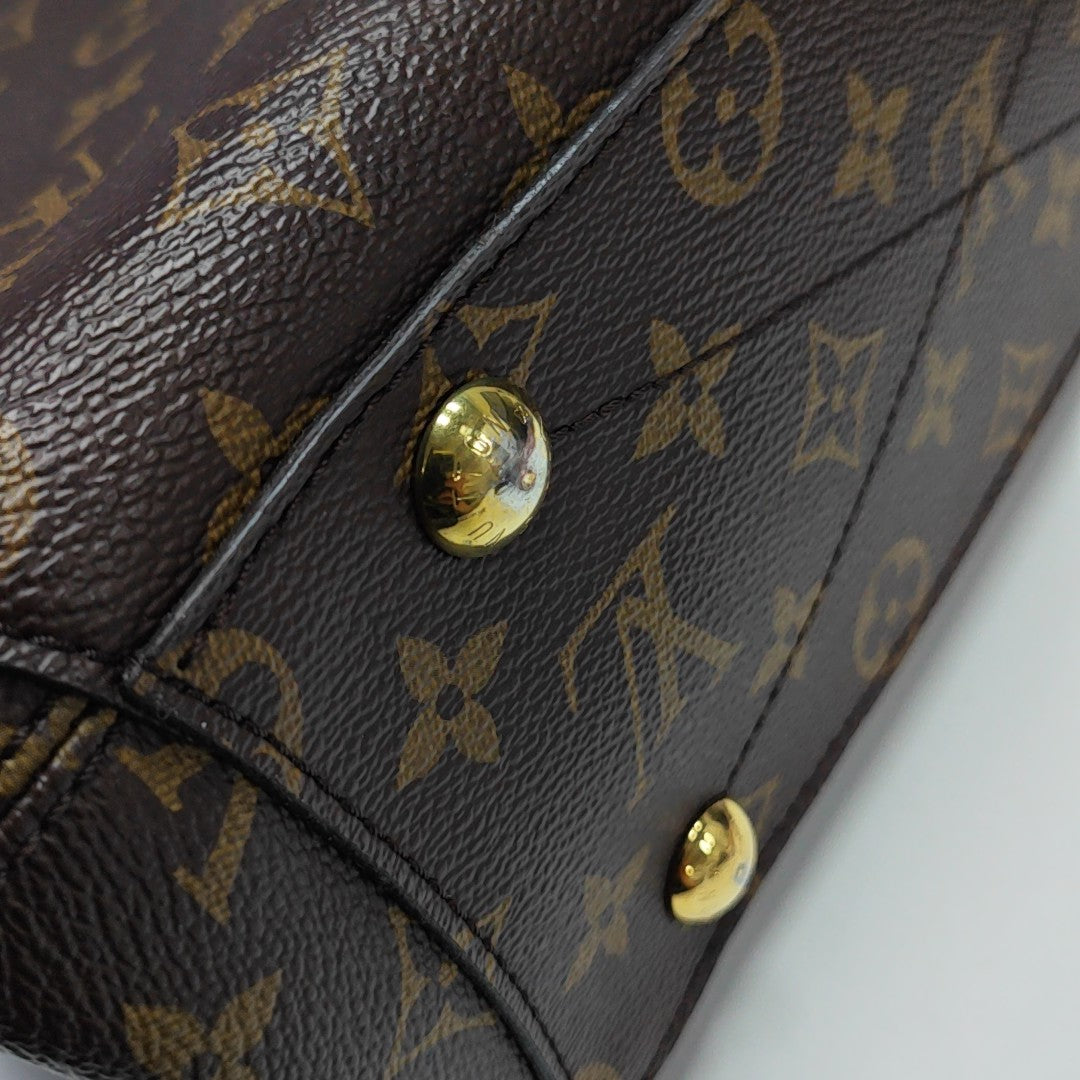 MONTAIGNE BB Monogram Coated Canvas Brown