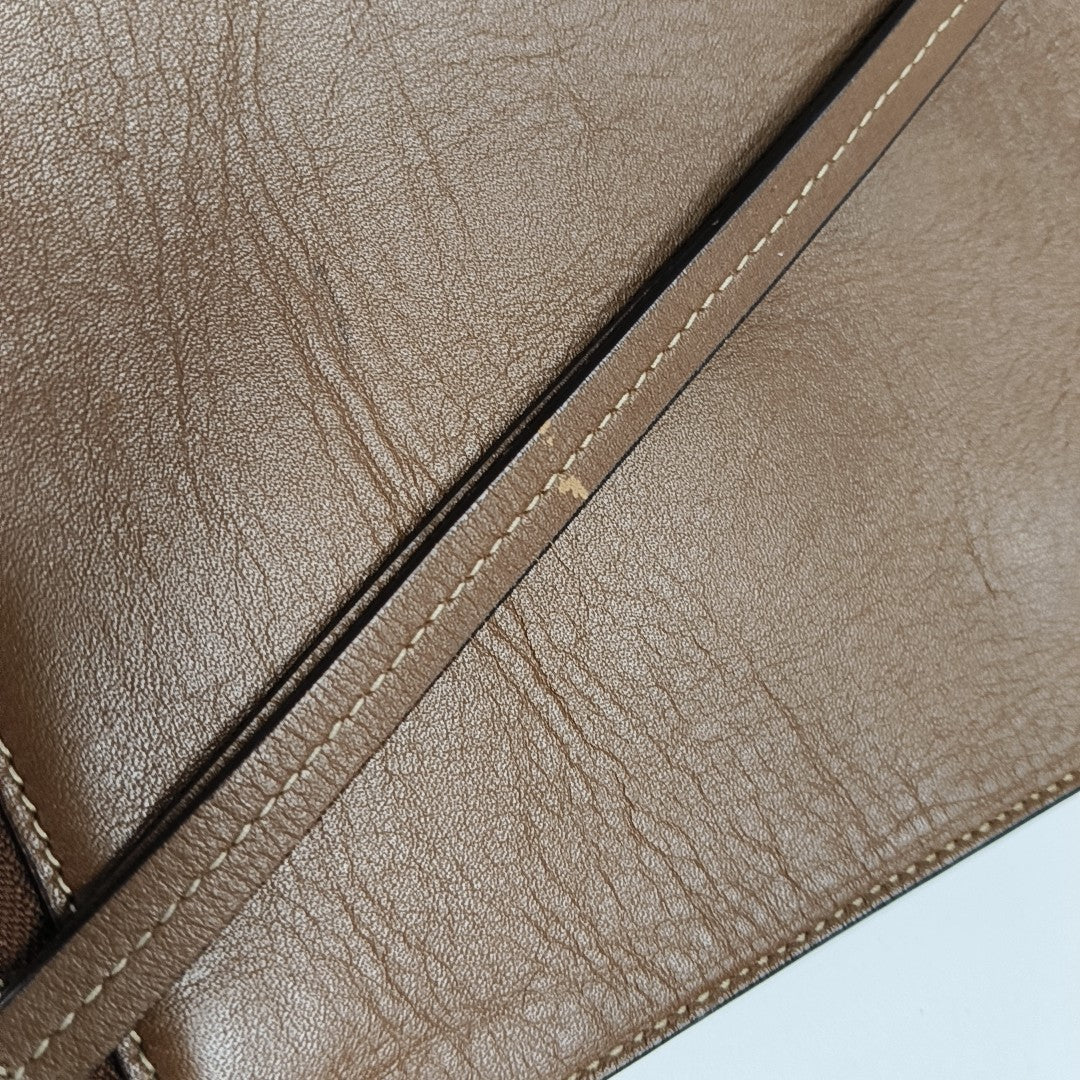 Monogram Coated Canvas Clutch Beige