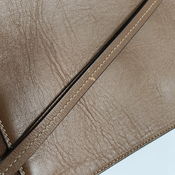 Monogram Coated Canvas Clutch Beige