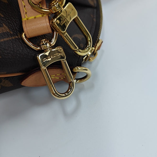 RIVOLI MM Monogram Coated Canvas Brown