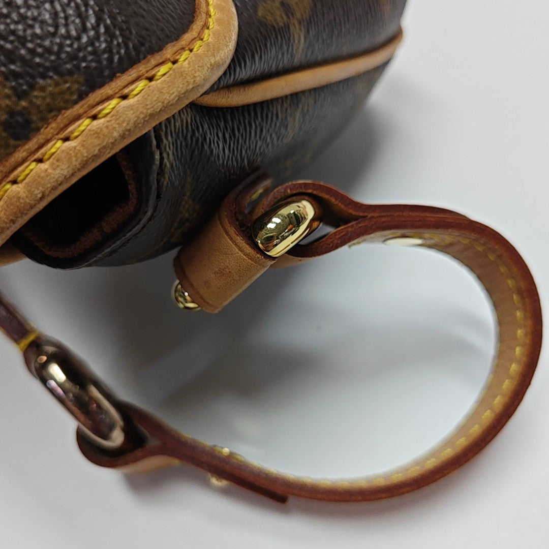 TIKAL Monogram Coated Canvas Brown