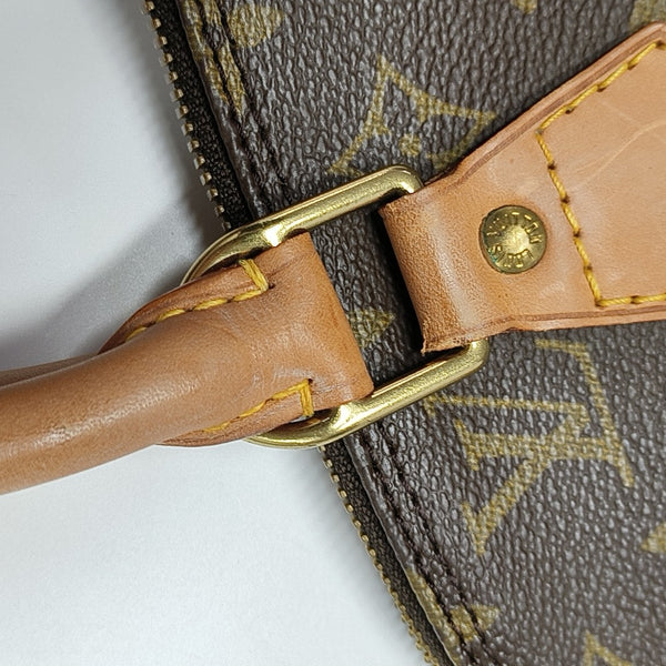 ALMA PM Monogram Coated Canvas Brown
