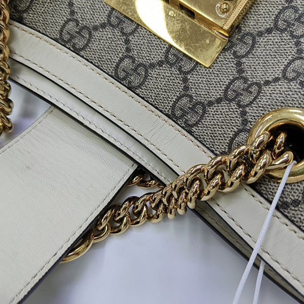 Padlock Small Monogram Coated Canvas Beige