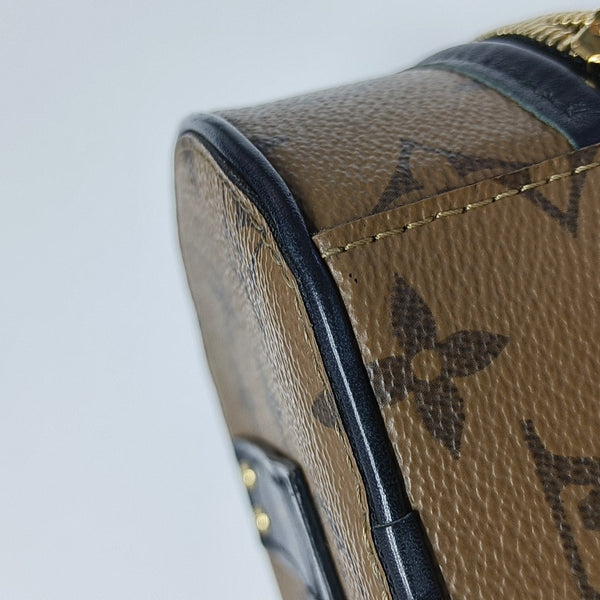 BOITE CHAPEAU Mini Monogram Coated Canvas Brown