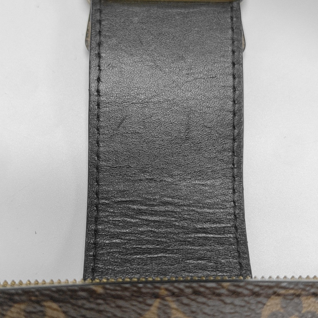 TRUNK Monogram Coated Canvas Brown