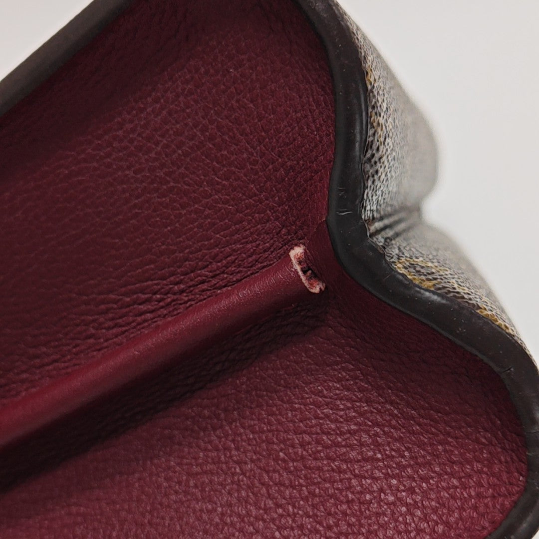 VICTOIRE Monogram Coated Canvas Brown