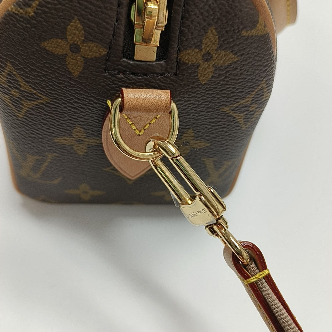 SPEEDY 20 Monogram Coated Canvas Brown
