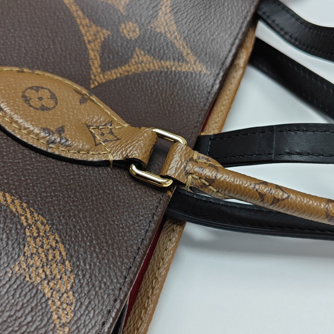 ONTHEGO GM Monogram Coated Canvas Brown