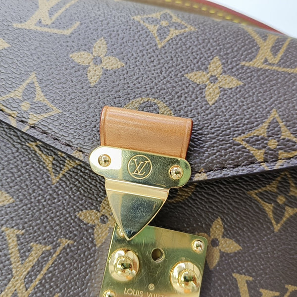 MÉTIS EAST WEST Monogram Coated Canvas Brown